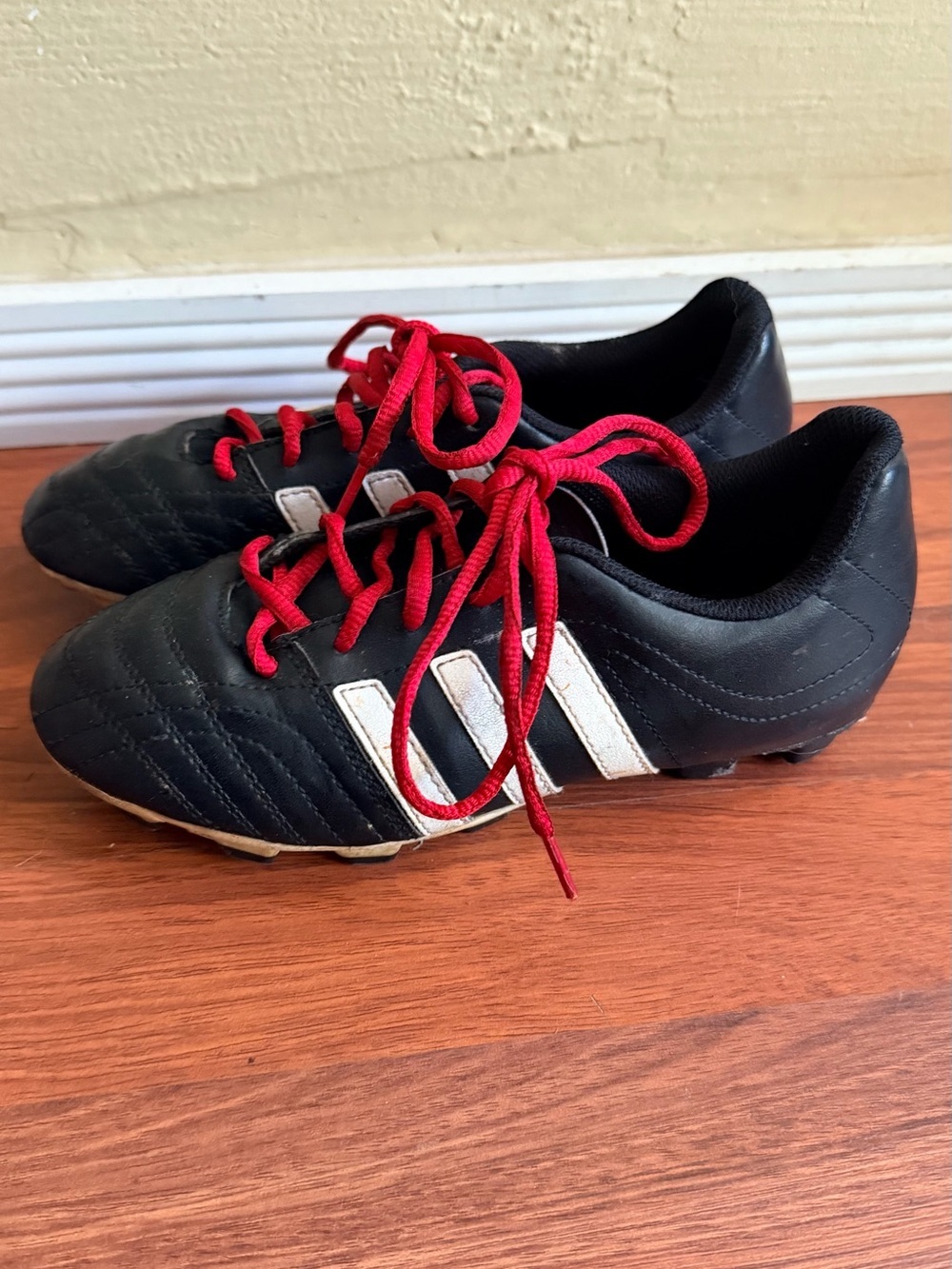 adidas Kids Black Soccer Cleats with Red Laces and White Stripes - Picture 3 of 5